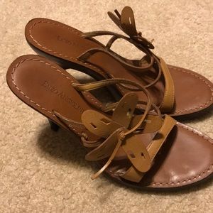 Size 7 1/2 heels with a flower on the side